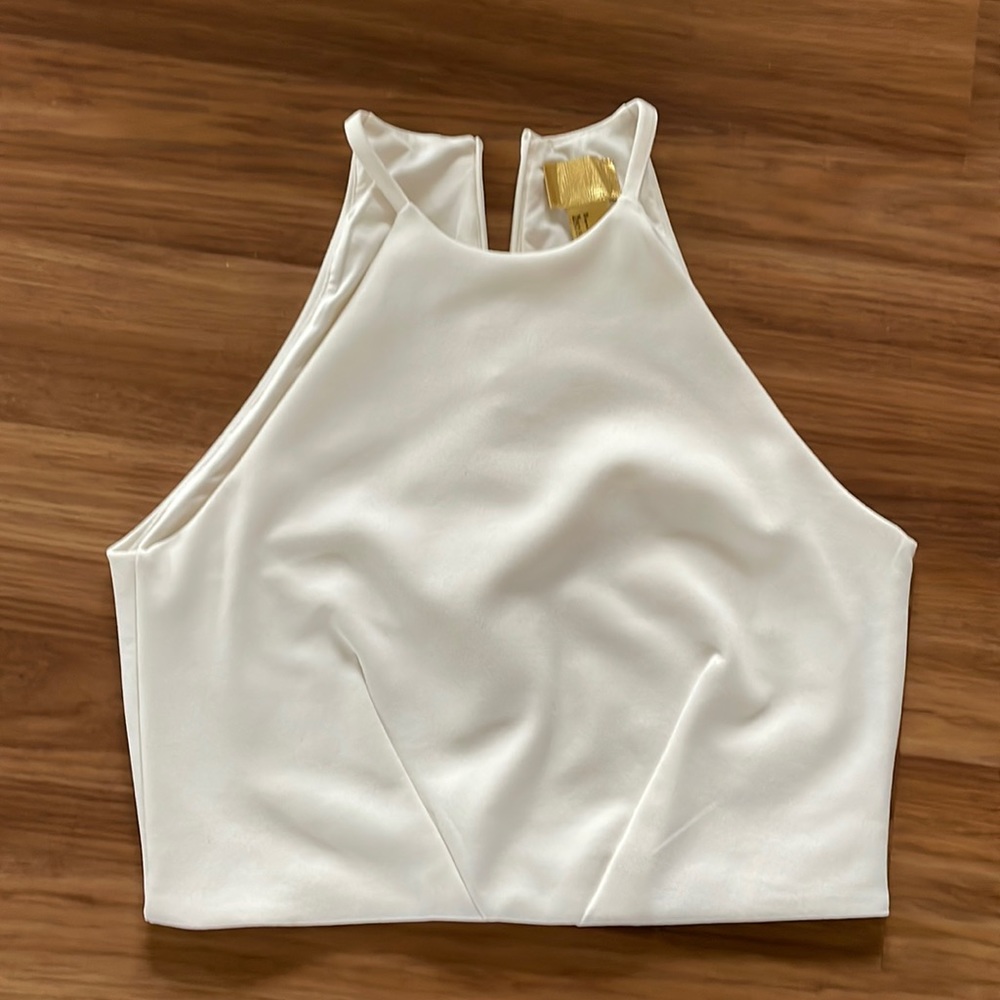 Size 8 cream crop top from H&M in like new condition.